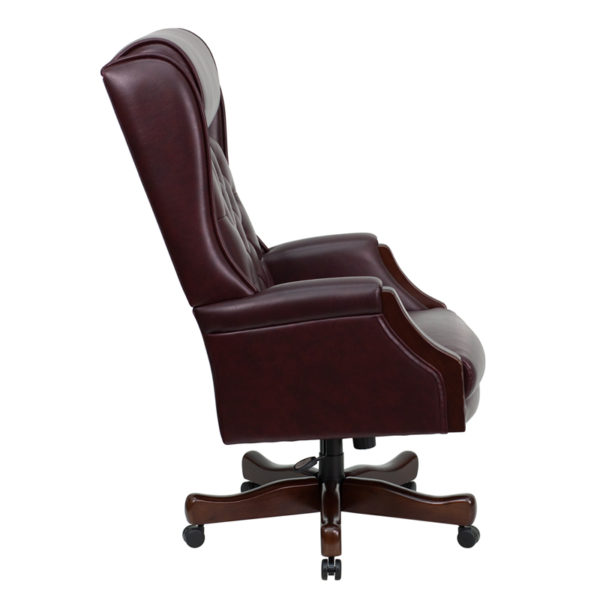 Nice High Back Traditional Tufted Leather Executive Swivel Ergonomic Office Chair with Headrest and Arms Button Tufted Back office chairs near  Windermere at Capital Office Furniture